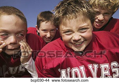 A group of young football players View Large Photo Image Picture - A group of young football players. Fotosearch