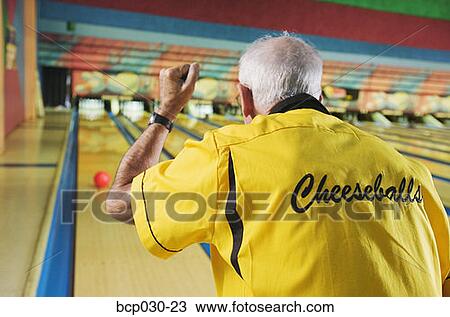 A senior man bowling View Large Photo Image Stock Image - A senior man bowling. Fotosearch