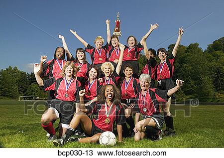 Female soccer team celebrating View Large Photo Image Stock Image - Female soccer team celebrating. Fotosearch