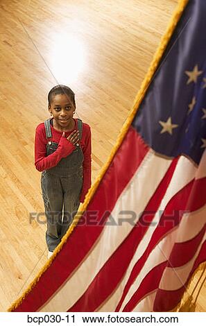 Girl reciting the pledge of allegiance View Large Photo Image Stock Image - Girl reciting the pledge of allegiance. Fotosearch