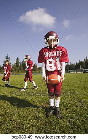 Group of young football players View Large Photo Image Stock Photo - Group of young football players. Fotosearch