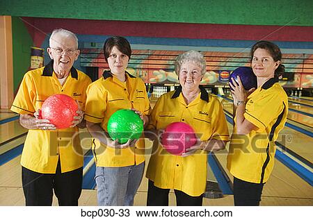 Portrait of a bowling team View Large Photo Image Stock Image - Portrait of a bowling team. Fotosearch