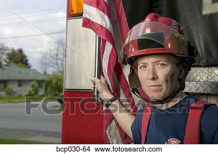Portrait of a female firefighter View Large Photo Image Picture - Portrait of a female firefighter. Fotosearch