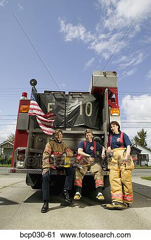 Portrait of three firefighters View Large Photo Image Stock Image - Portrait of three firefighters. Fotosearch