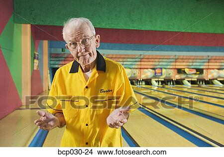Senior man at a bowling alley View Large Photo Image Picture - Senior man at a bowling alley. Fotosearch
