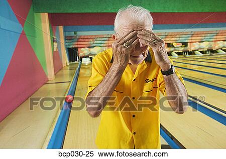Senior man at a bowling alley View Large Photo Image Stock Photography - Senior man at a bowling alley. Fotosearch
