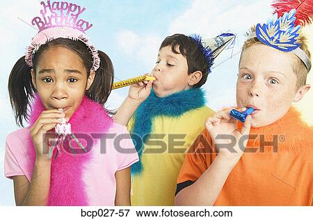 Boys and girl in party hats View Large Photo Image Stock Photo - Boys and girl in party hats. Fotosearch