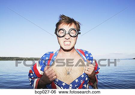 Man acting like a super hero View Large Photo Image Stock Photograph - Man acting like a super hero. Fotosearch