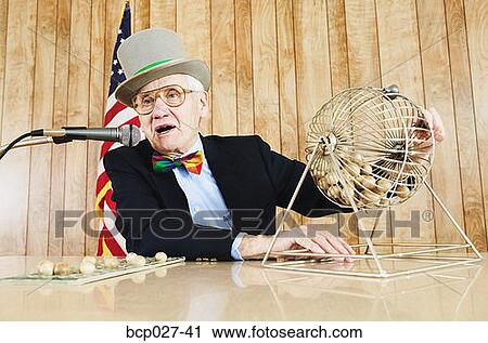 Stock Image - Man calling out bingo. Fotosearch