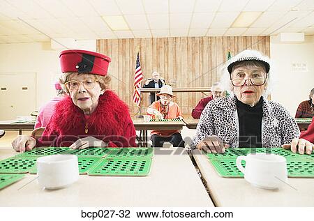 Pair of women playing bingo View Large Photo Image Stock Image - Pair of women playing bingo. Fotosearch