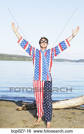 Stock Photograph - Strangely dressed man greeting the day. Fotosearch