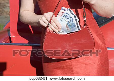 Woman holding euro banknotes View Large Photo Image Stock Image - Woman holding euro banknotes. Fotosearch