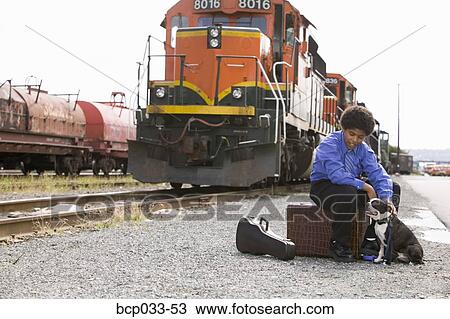 Boy with luggage and Boston Terrier View Large Photo Image Stock Image - Boy with luggage and Boston Terrier. Fotosearch