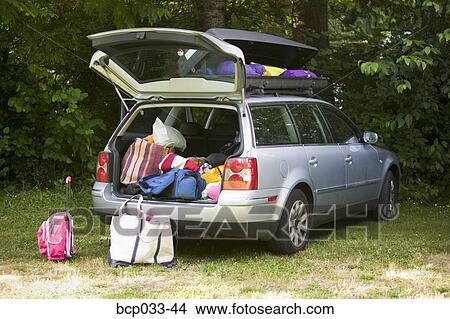 Car packed with luggage View Large Photo Image Picture - Car packed with luggage. Fotosearch