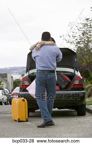 Happy couple hugging View Large Photo Image Stock Photo - Happy couple hugging. Fotosearch