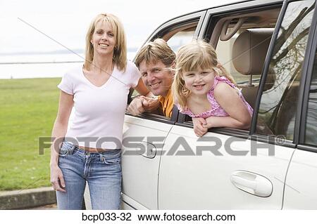 Happy family together in car View Large Photo Image Stock Image - Happy family together in car. Fotosearch