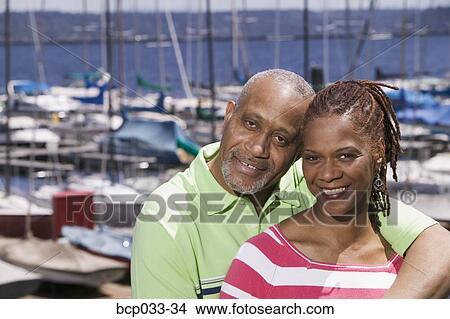 Portrait of couple at marina View Large Photo Image Picture - Portrait of couple at marina. Fotosearch