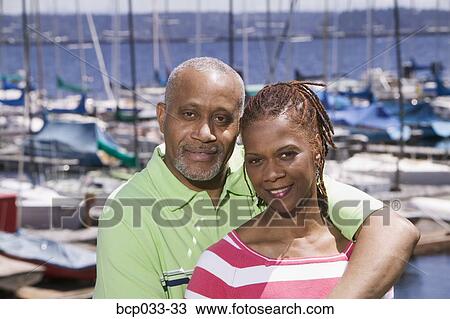 Portrait of couple at marina View Large Photo Image Stock Image - Portrait of couple at marina. Fotosearch