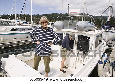 Senior couple on boat View Large Photo Image Stock Photo - Senior couple on boat. Fotosearch