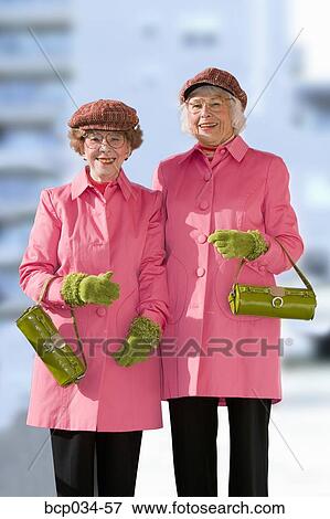 Senior women dressed alike View Large Photo Image Stock Photo - Senior women dressed alike. Fotosearch