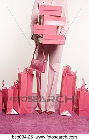 Woman with boxes and shopping bags View Large Photo Image Stock Photography - Woman with boxes and shopping bags. Fotosearch
