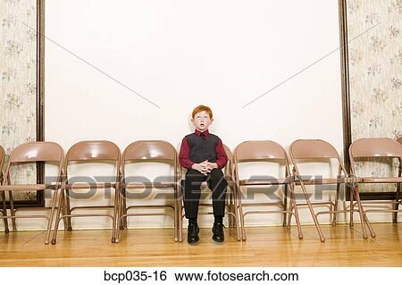 Boy sitting alone View Large Photo Image Stock Photograph - Boy sitting alone. Fotosearch