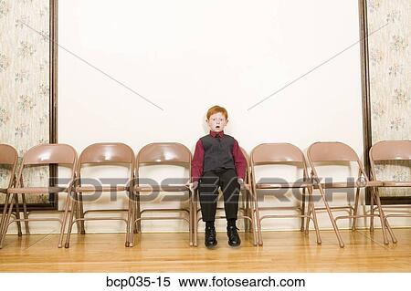 Boy sitting alone View Large Photo Image Stock Photography - Boy sitting alone. Fotosearch