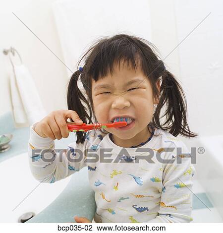 Girl brushing teeth View Large Photo Image Stock Image - Girl brushing teeth. Fotosearch