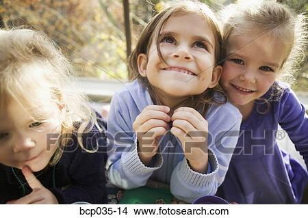 Girls having fun together View Large Photo Image Picture - Girls having fun together. Fotosearch