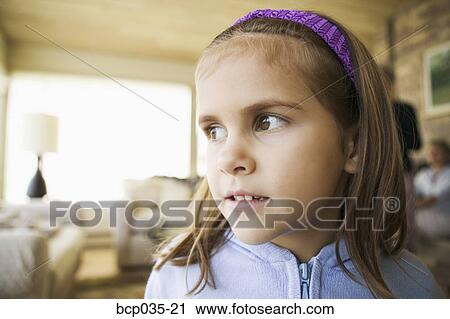Stock Image - Portrait of girl looking away. Fotosearch