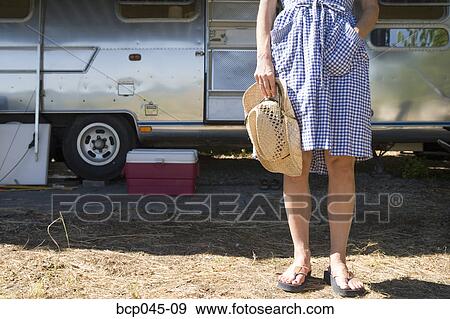 Female legs in front of RV View Large Photo Image Stock Photo - Female legs in front of RV. Fotosearch