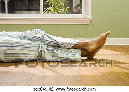 Man lounging at home in pajamas View Large Photo Image Stock Image - Man lounging at home in pajamas. Fotosearch