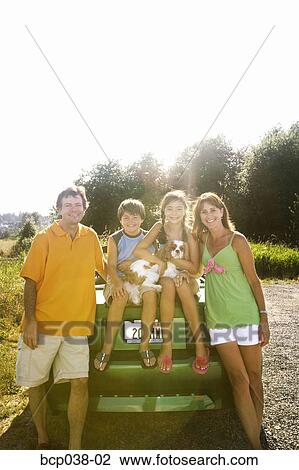 Stock Image - Family portrait outdoors. Fotosearch