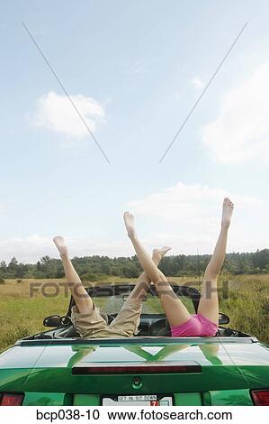 Kids upside down in backseat of car View Large Photo Image Stock Image - Kids upside down in backseat of car. Fotosearch