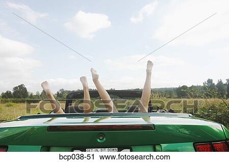 Kids upside down in backseat of car View Large Photo Image Stock Image - Kids upside down in backseat of car. Fotosearch