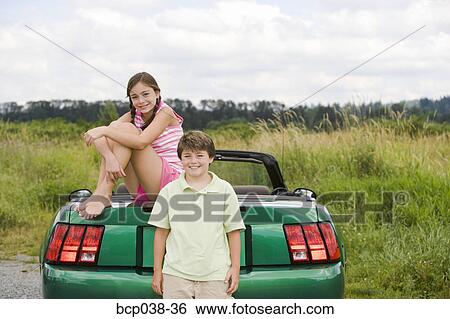 Portrait of a brother and sister outdoors View Large Photo Image Stock Photograph - Portrait of a brother and sister outdoors. Fotosearch