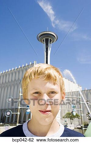 Stock Image - Boy in front of Space Needle Seattle WA. Fotosearch