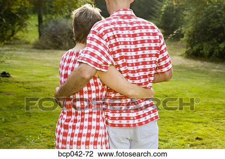 Couple in matching picnic clothing View Large Photo Image Stock Image - Couple in matching picnic clothing. Fotosearch