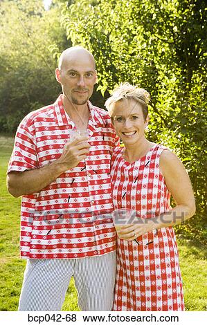 Couple with matching picnic clothing View Large Photo Image Stock Photo - Couple with matching picnic clothing. Fotosearch