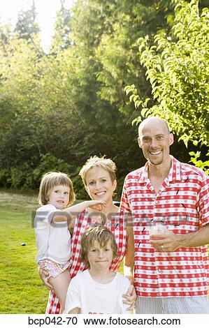 Portrait of family in picnic clothing View Large Photo Image Stock Image - Portrait of family in picnic clothing. Fotosearch
