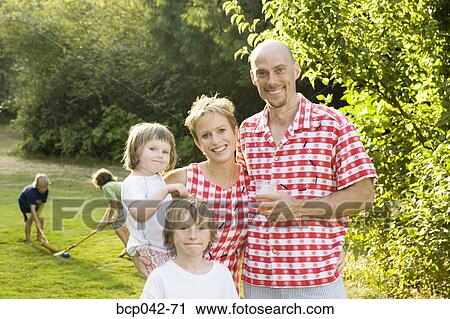 Portrait of family in picnic clothing View Large Photo Image Stock Image - Portrait of family in picnic clothing. Fotosearch
