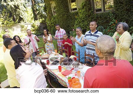 Enthusiastic family at picnic View Large Photo Image Stock Image - Enthusiastic family at picnic. Fotosearch