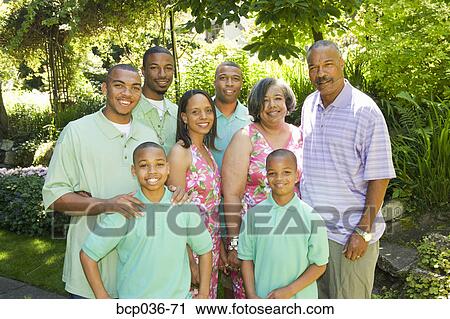 Family posing outdoors View Large Photo Image Stock Image - Family posing outdoors. Fotosearch