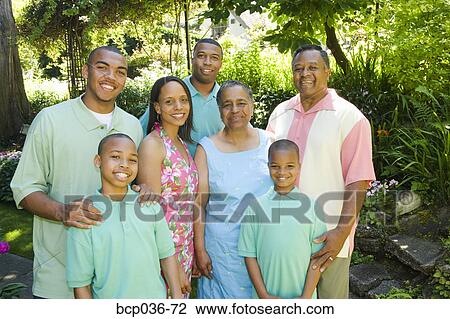Stock Image - Family posing outdoors. Fotosearch