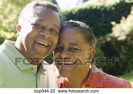 Portrait of couple outdoors View Large Photo Image Stock Image - Portrait of couple outdoors. Fotosearch