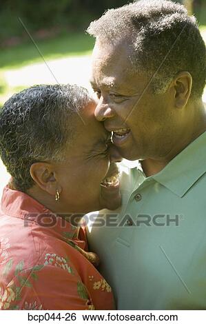 Portrait of couple outdoors View Large Photo Image Stock Photograph - Portrait of couple outdoors. Fotosearch