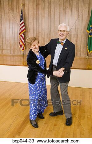Stock Image - Senior couple dancing. Fotosearch