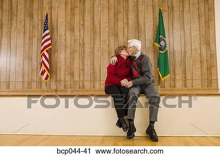 Senior couple kissing View Large Photo Image Stock Image - Senior couple kissing. Fotosearch