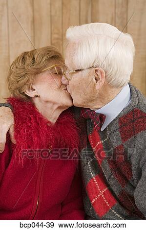 Senior couple kissing View Large Photo Image Stock Photo - Senior couple kissing. Fotosearch