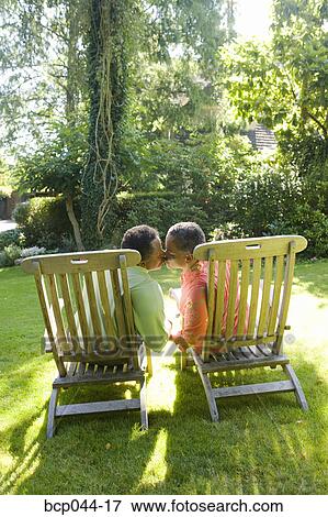 Seniors kissing outdoors View Large Photo Image Stock Photo - Seniors kissing outdoors. Fotosearch